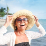 woman smiling on the beach
