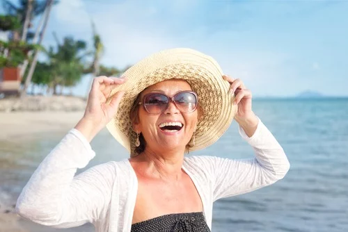 woman smiling on the beach